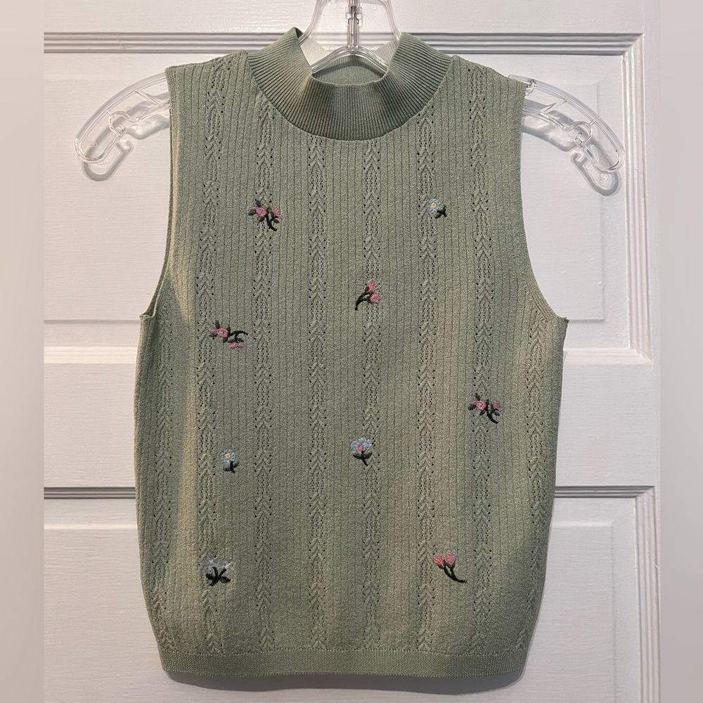 Green sleeveless sweater